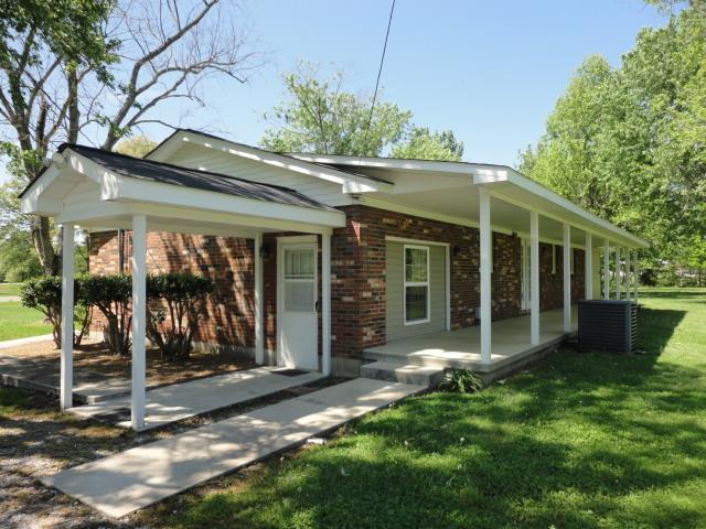464 Elora Road Elora, TN 37328 - Photo 3 of 20 a view of a house with a large window and a yard