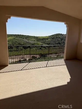 a view of a lake from a balcony