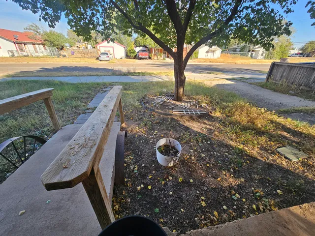 a view of a yard with an outdoor space