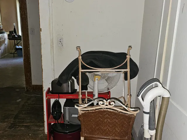 a room with a door and a rug