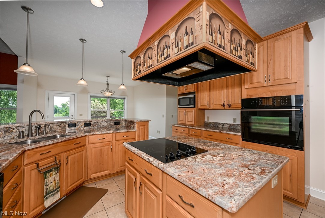 4477 Windfall Road Medina, OH 44256 - Photo 8 of 35 Island/Cooktop