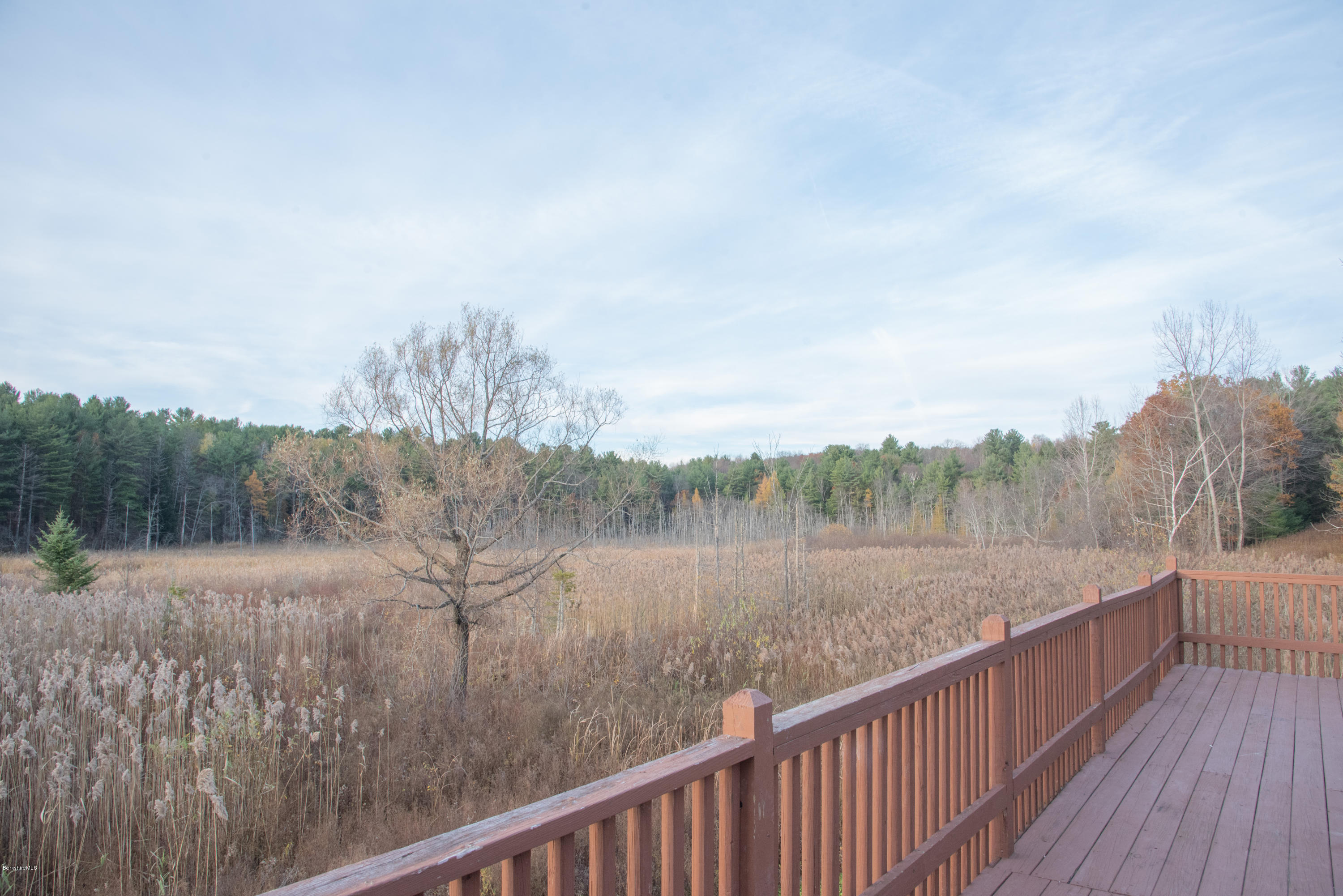 518 Swamp Road Richmond, MA 01201 - Photo 22 of 23 a view of a lake from a balcony