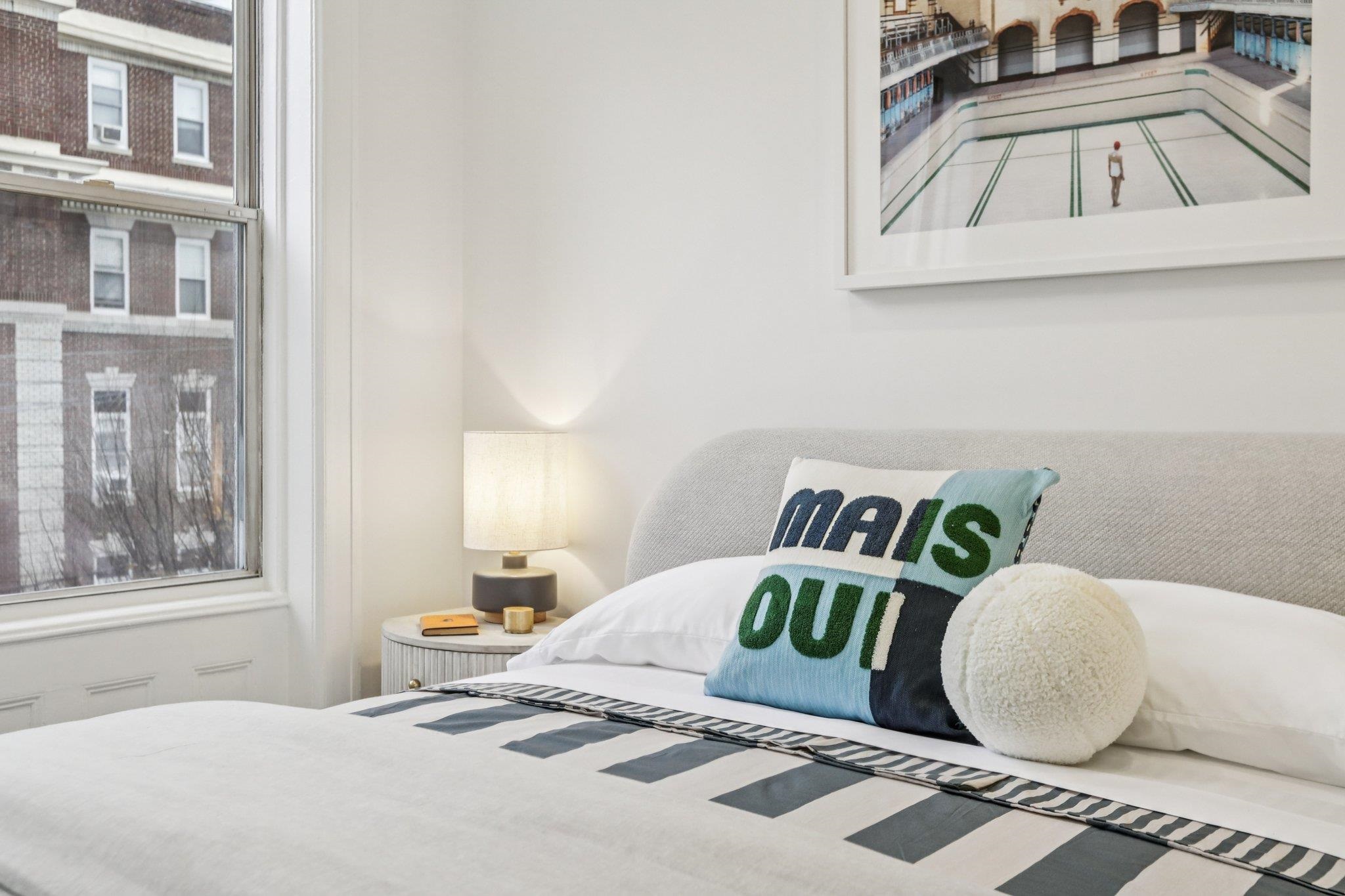 97 Clifton Terrace, Unit 6 Weehawken, NJ 07086 - Photo 23 of 36 a view of a bedroom with a bed