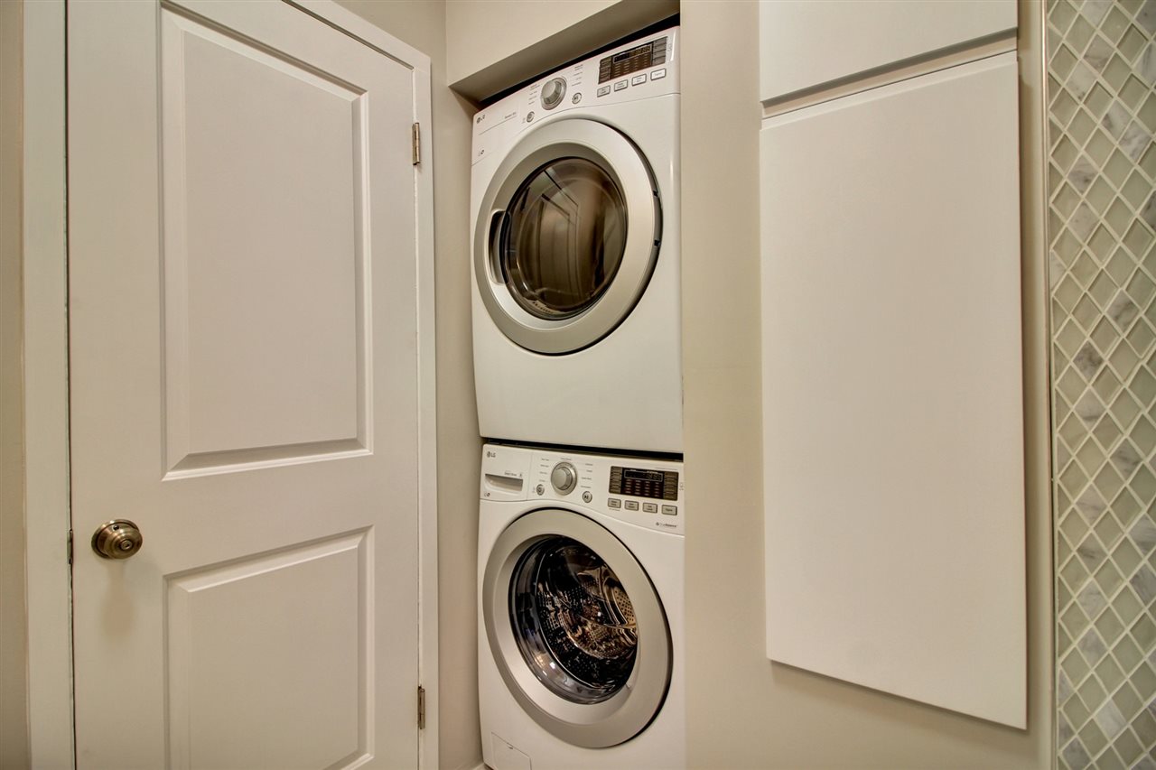 97 Clifton Terrace, Unit 6 Weehawken, NJ 07086 - Photo 25 of 36 a utility room with dryer and washer