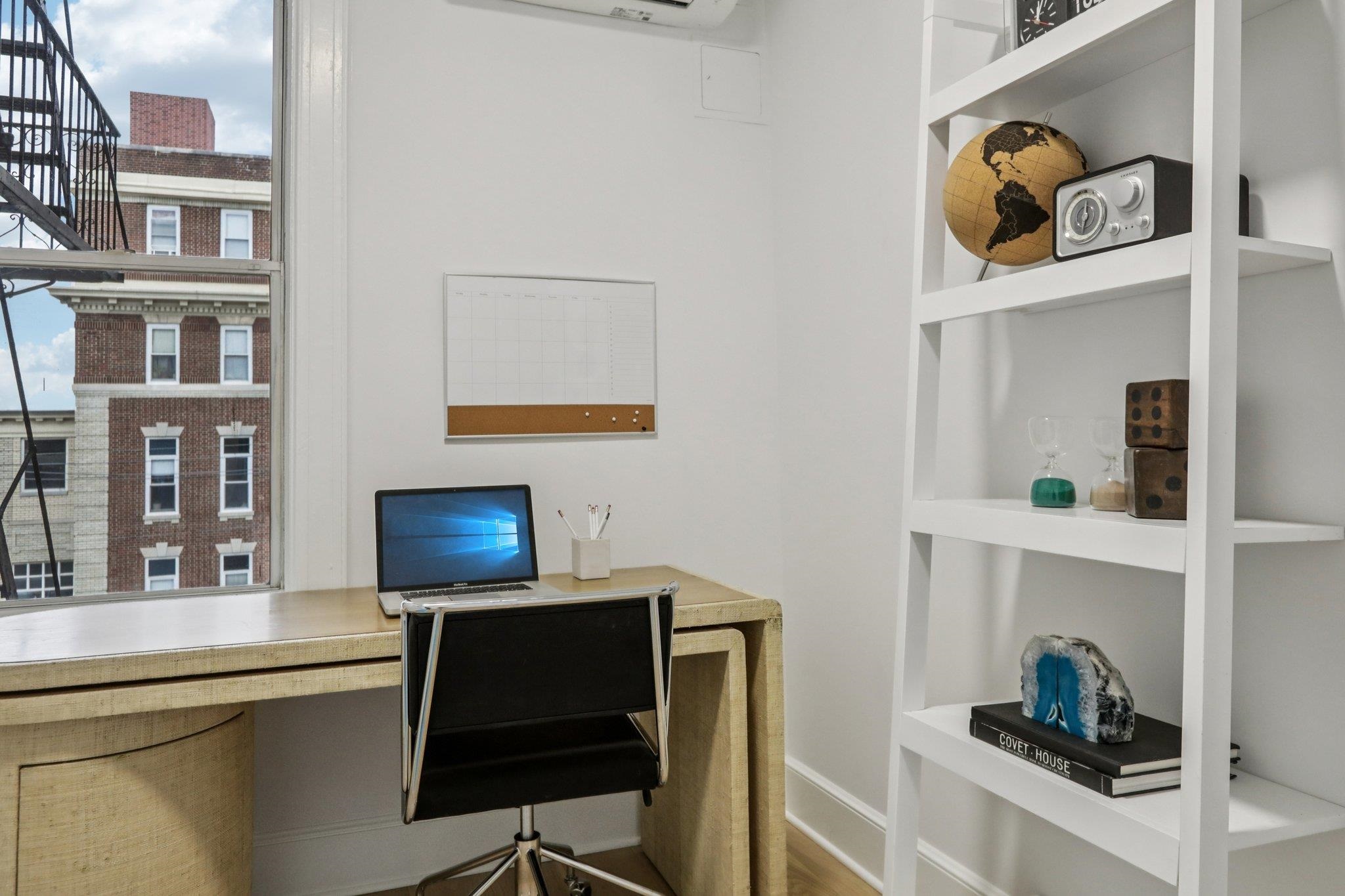 97 Clifton Terrace, Unit 6 Weehawken, NJ 07086 - Photo 28 of 36 a living room with furniture and decor