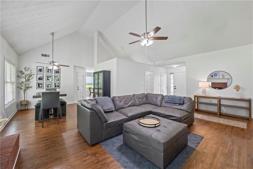 2630 Track Way Dacula, GA 30019 - Photo 11 of 27 a living room with furniture and wooden floor