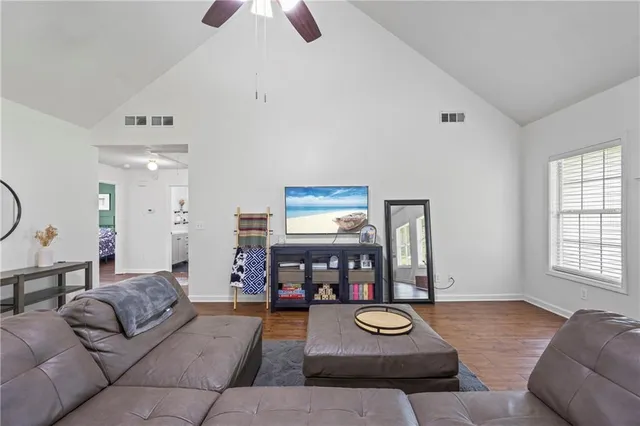 a living room with furniture and a window
