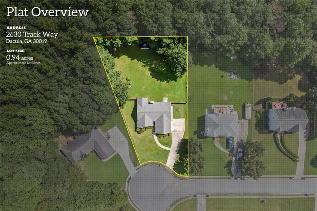 2630 Track Way Dacula, GA 30019 - Photo 26 of 27 an aerial view of a house with outdoor space swimming pool and lake view