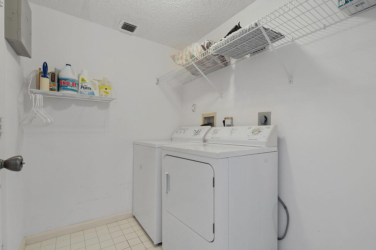 329 Hammocks Trail Greenacres, FL 33413 - Photo 23 of 28 LARGE LAUNDRY ROOM