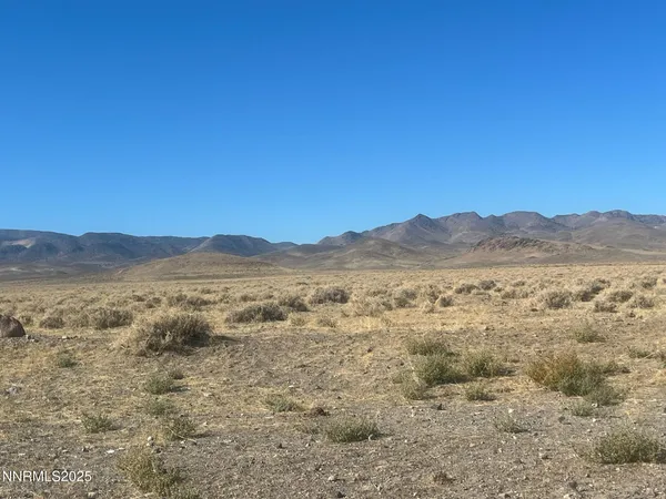 a view of an outdoor space with mountain view
