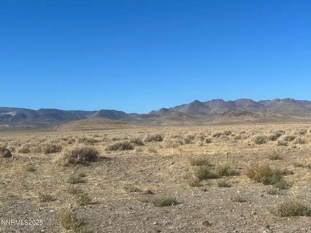 a view of an outdoor space with mountain view