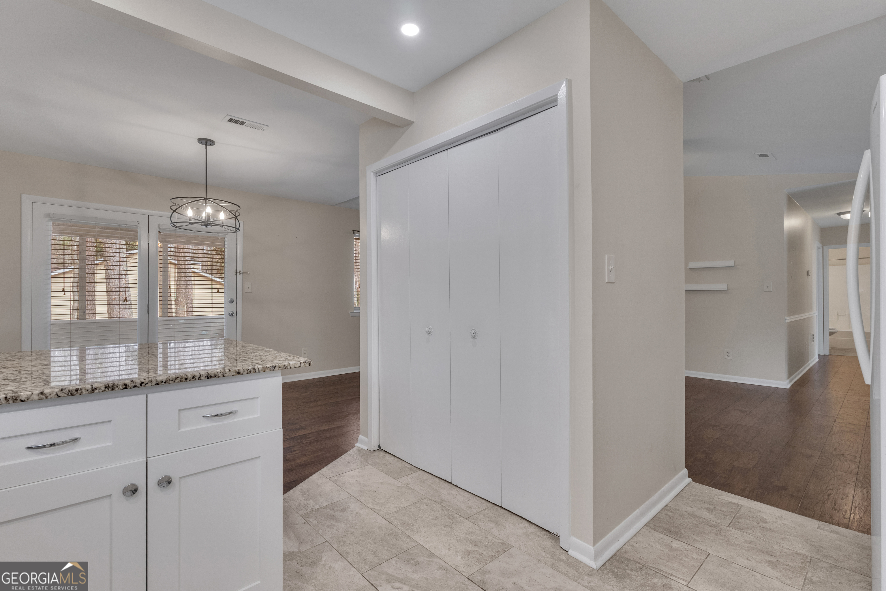 101 Dove Rise Peachtree City, GA 30269 - Photo 16 of 41 a bathroom with a granite countertop sink a mirror and a shower