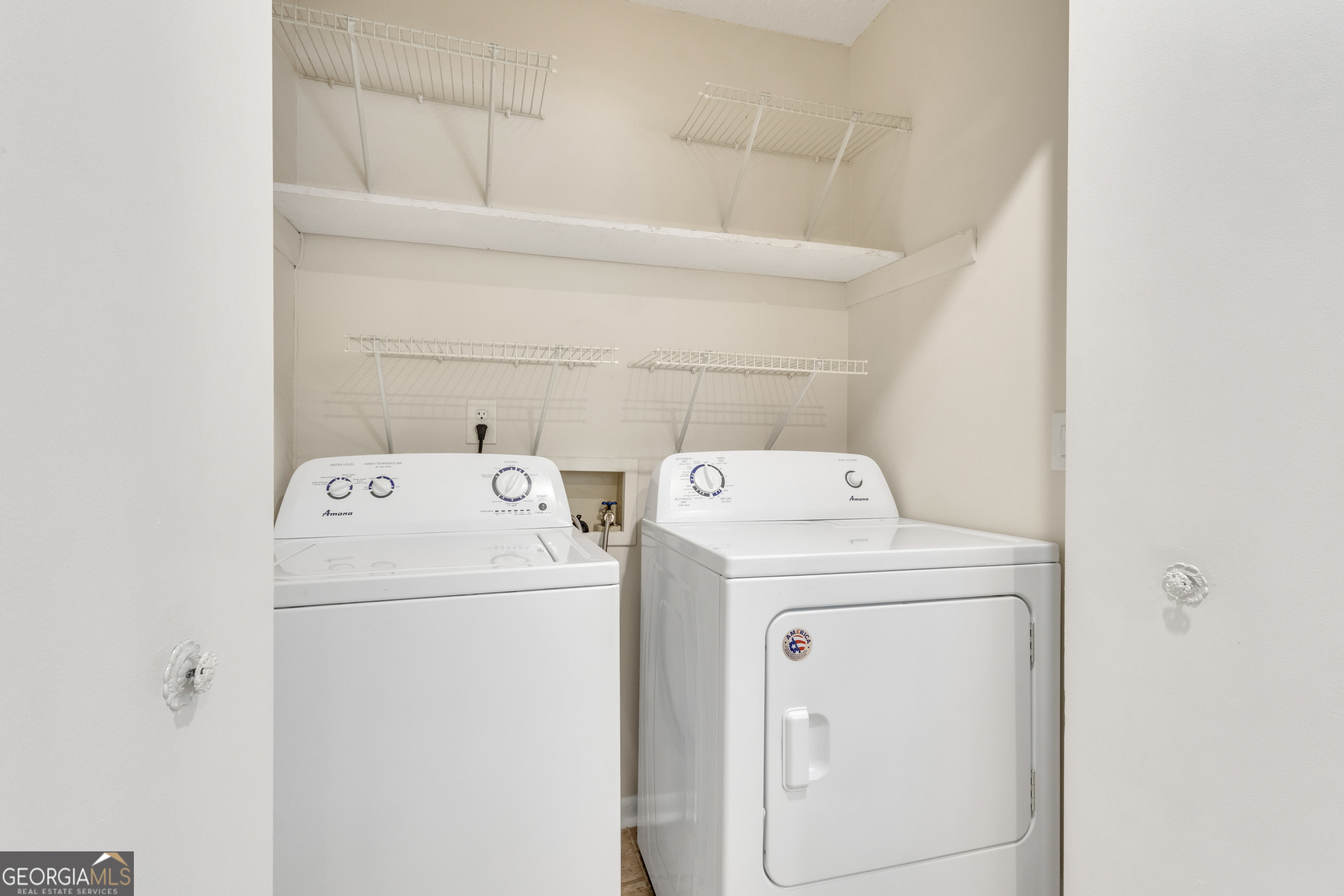 101 Dove Rise Peachtree City, GA 30269 - Photo 17 of 41 a utility room with dryer and washer