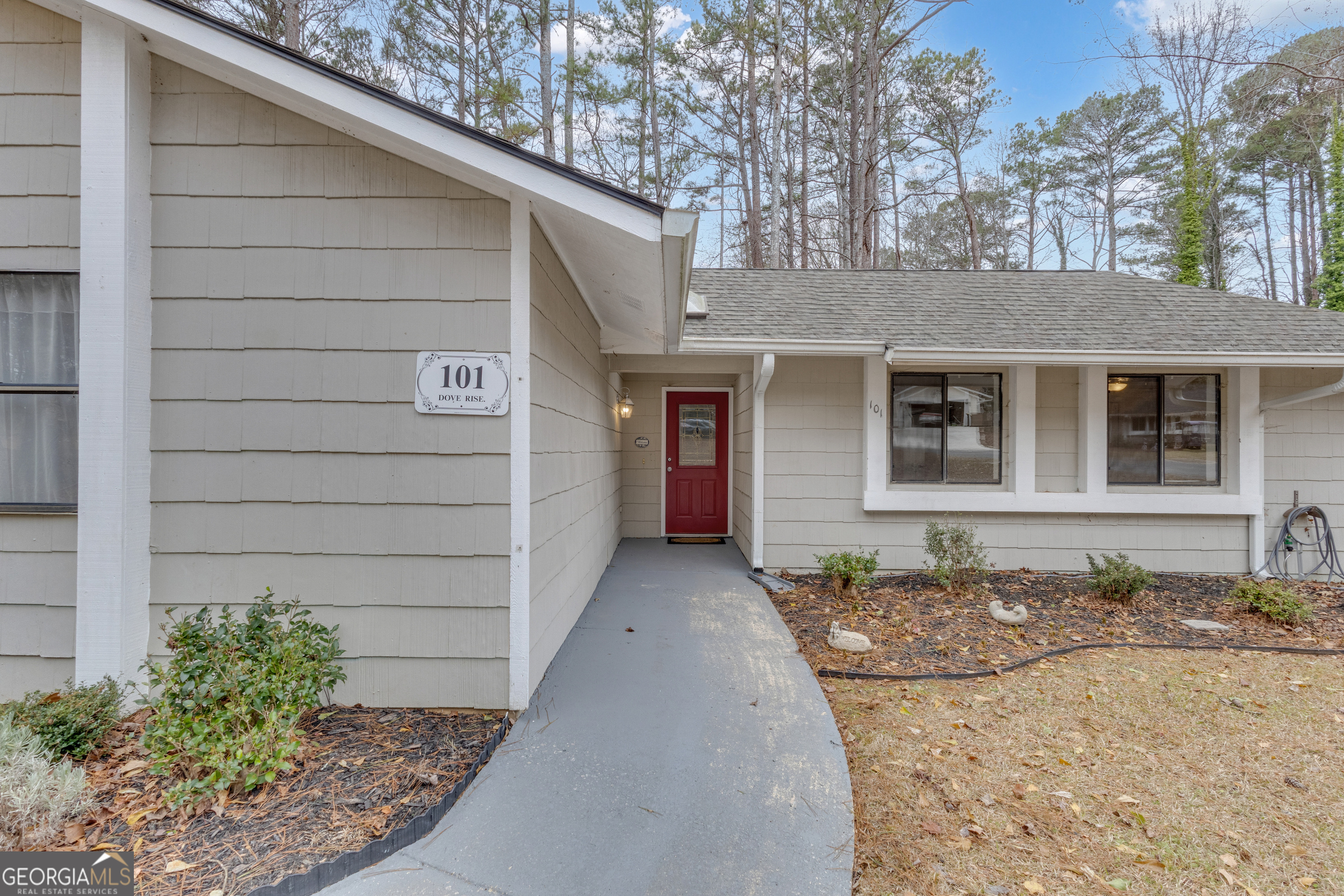 101 Dove Rise Peachtree City, GA 30269 - Photo 2 of 41 a front view of a house with a yard