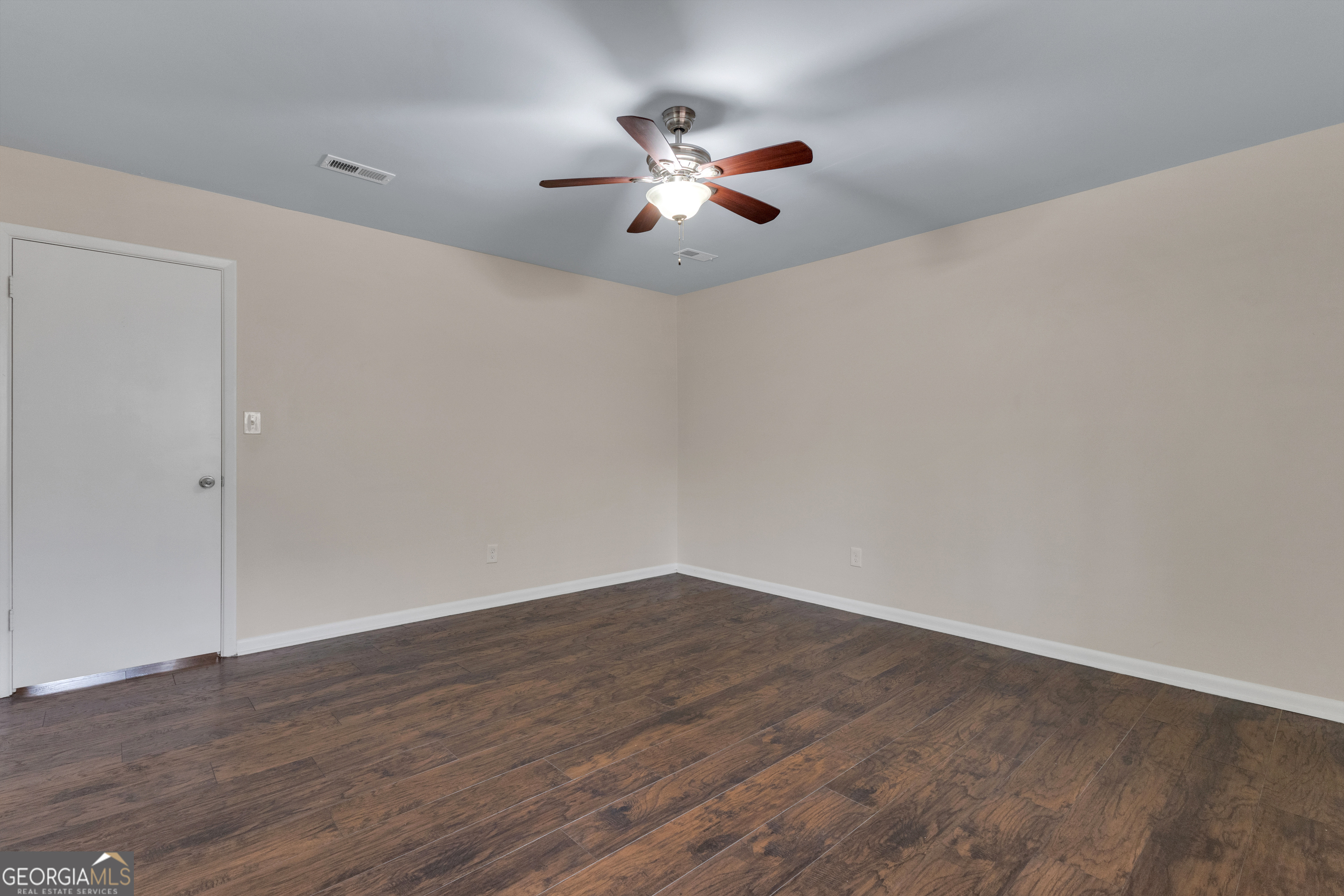 101 Dove Rise Peachtree City, GA 30269 - Photo 21 of 41 a view of an empty room with wooden floor