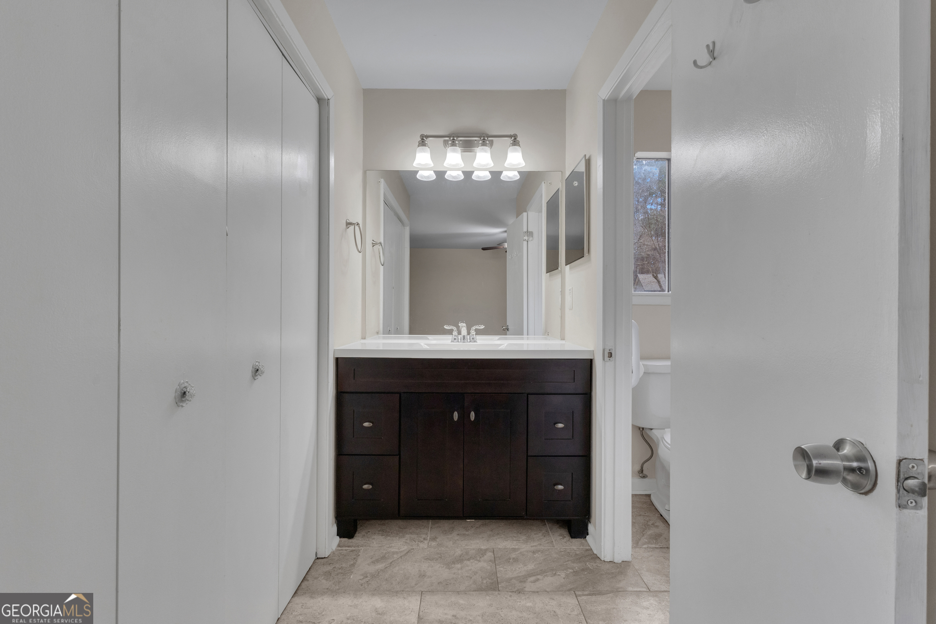 101 Dove Rise Peachtree City, GA 30269 - Photo 22 of 41 a bathroom with a sink and a mirror