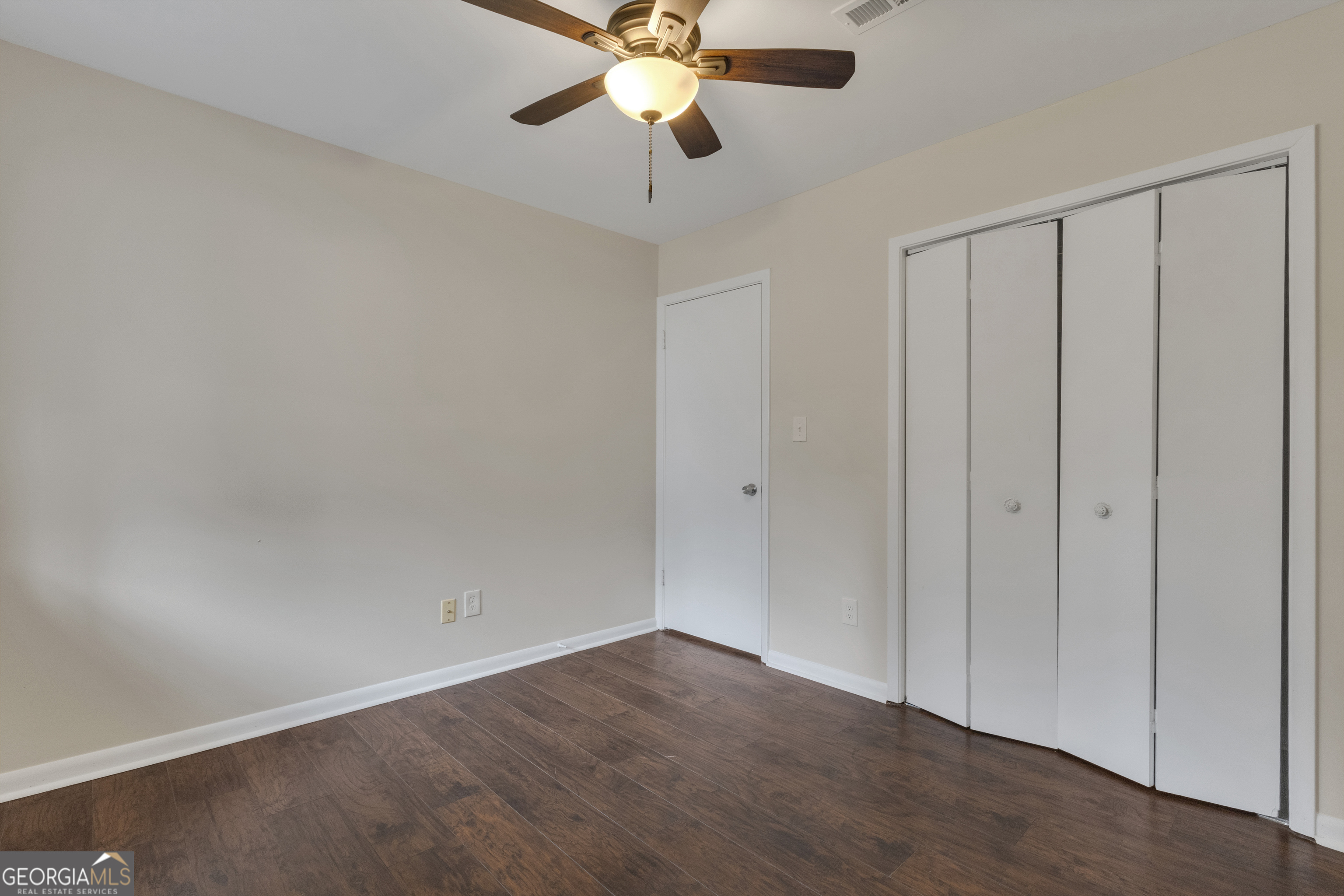 101 Dove Rise Peachtree City, GA 30269 - Photo 26 of 41 a view of an empty room and chandelier fan