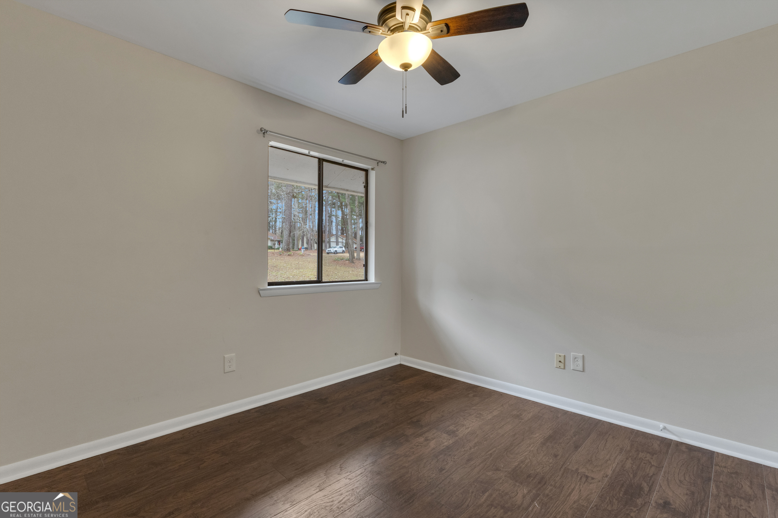 101 Dove Rise Peachtree City, GA 30269 - Photo 31 of 41 wooden floor in an empty room with a window