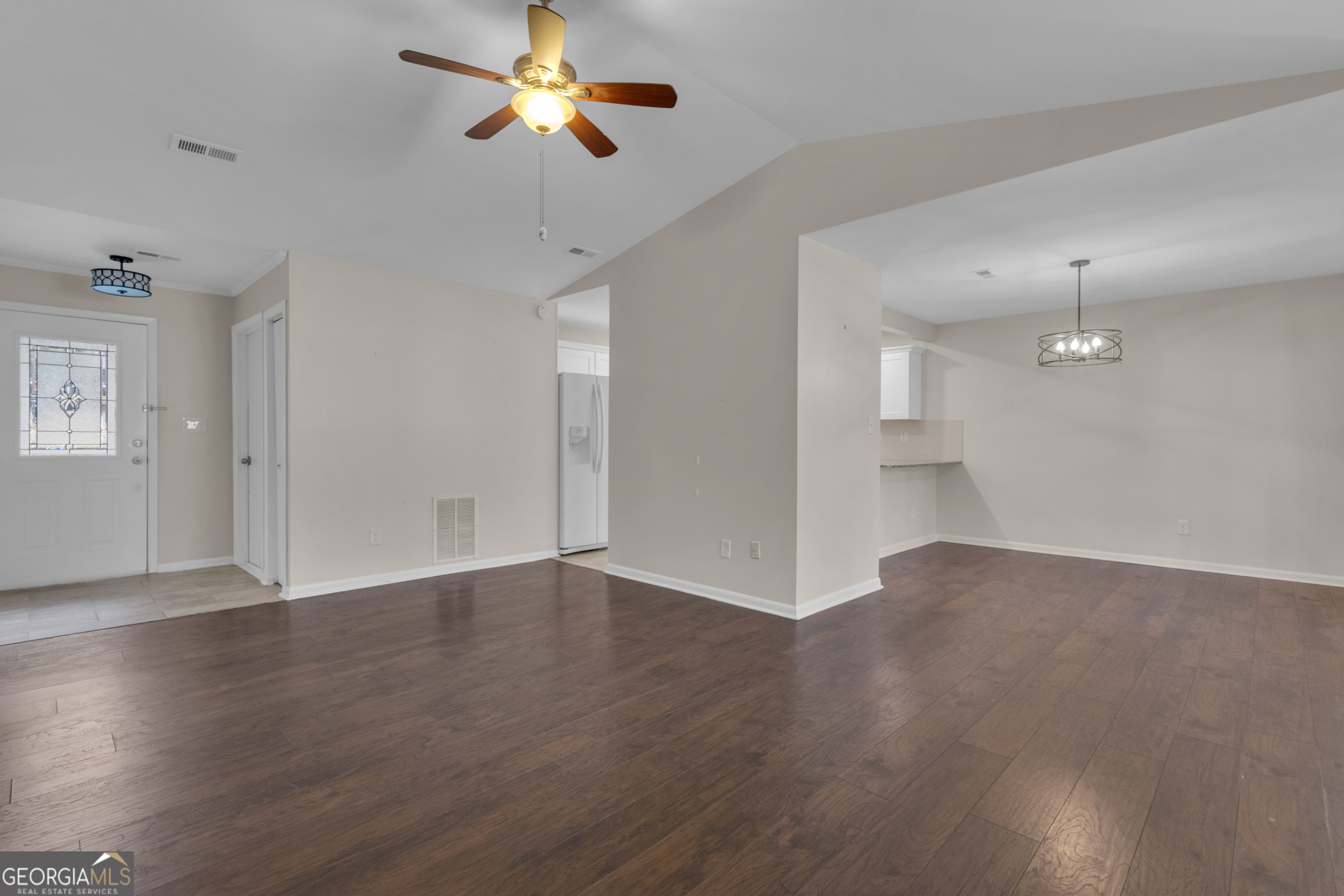 101 Dove Rise Peachtree City, GA 30269 - Photo 7 of 41 wooden floor in an empty room with a window
