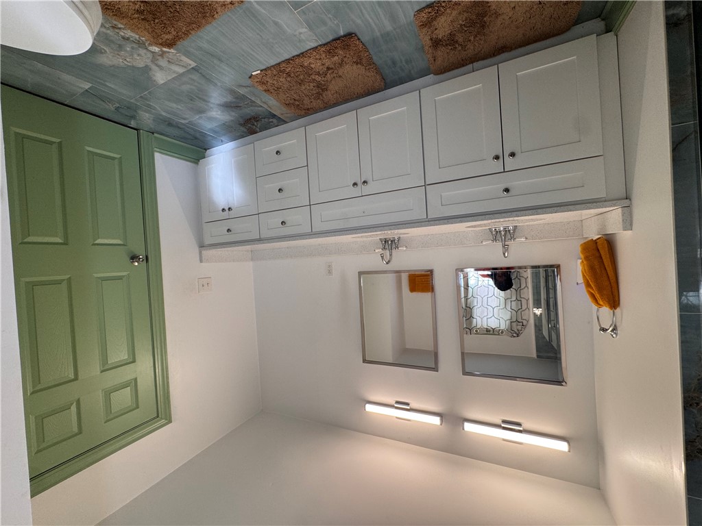 2211 East River Street Anderson, SC 29621 - Photo 38 of 40 This bathroom features stylish storage and functional fixtures.