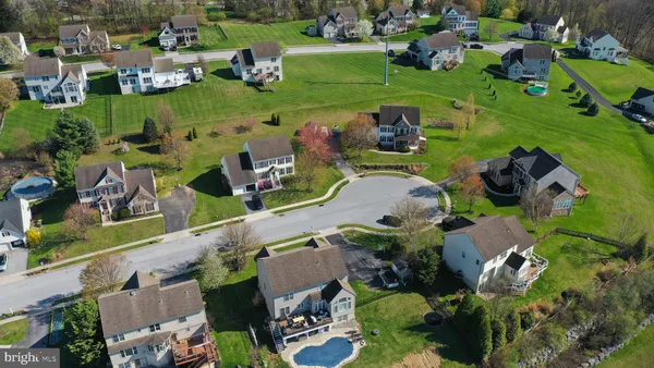 a view of a house with a big yard
