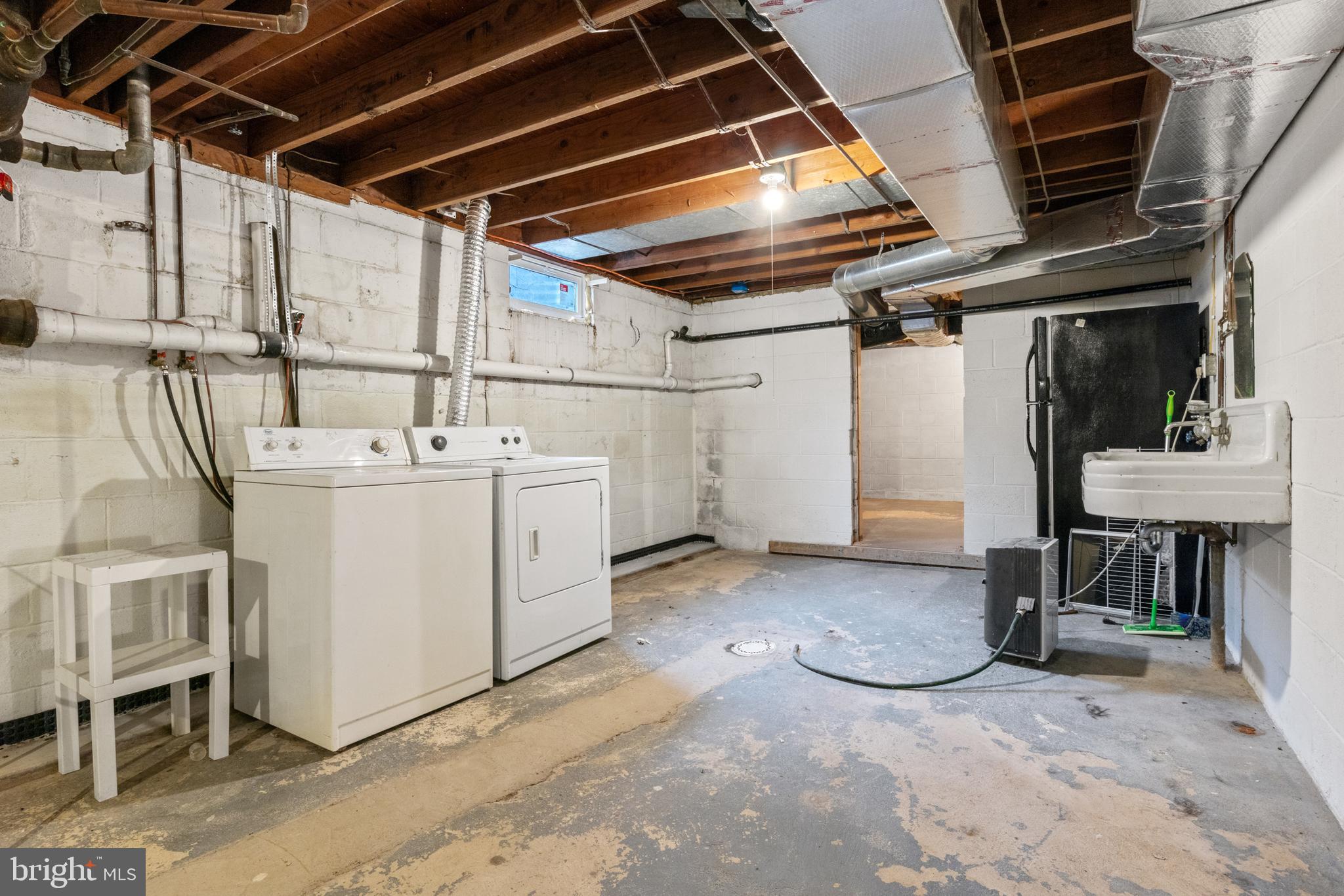 2465 Carlisle Road York, PA 17408 - Photo 35 of 56 a utility room with dryer and washer