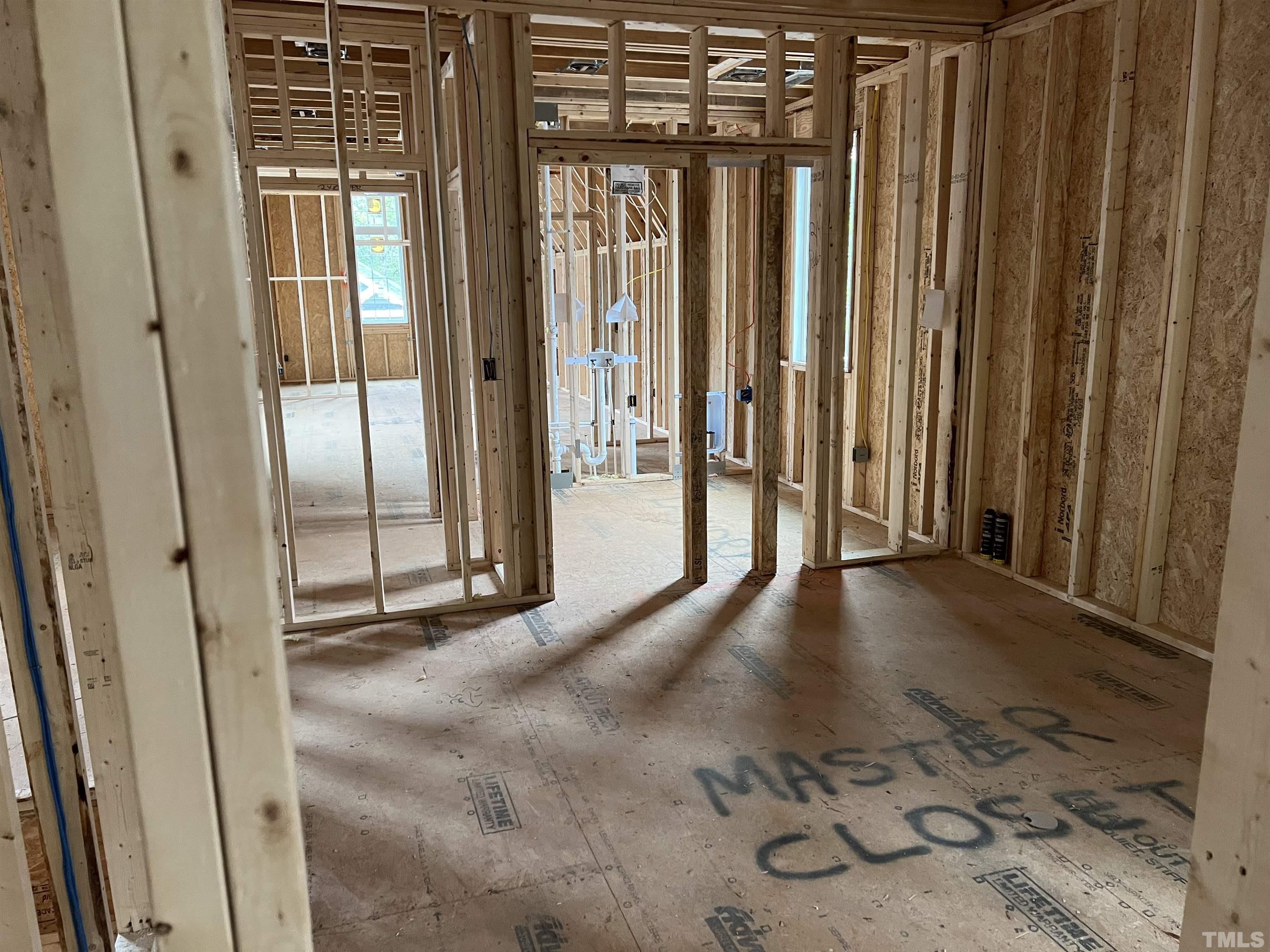 6309 Stephens Ridge Raleigh, NC 27615 - Photo 13 of 14 a view of a livingroom with wooden floor and floor to ceiling window
