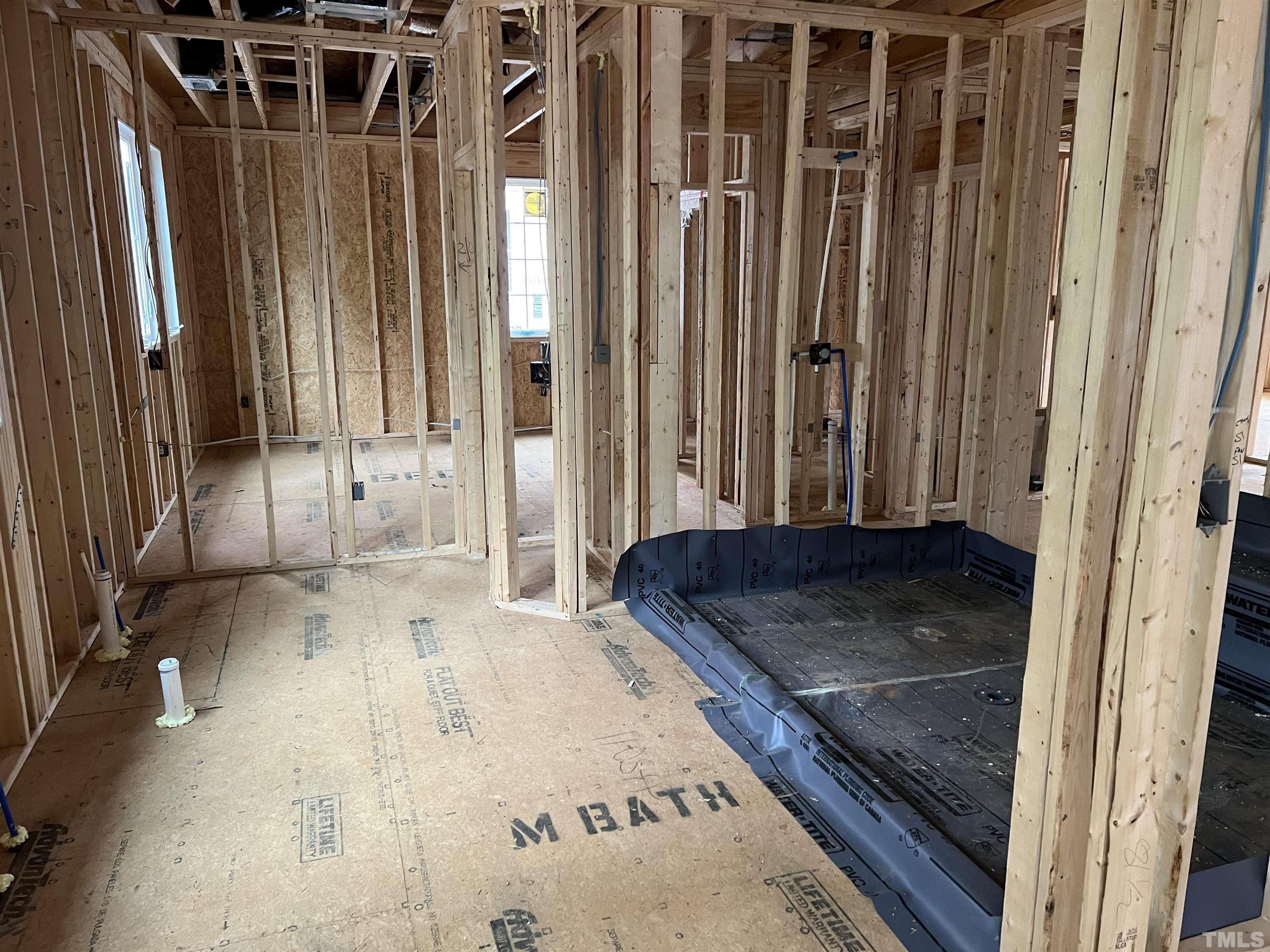 6309 Stephens Ridge Raleigh, NC 27615 - Photo 14 of 14 a view of a hallway with a couch and the entryway door
