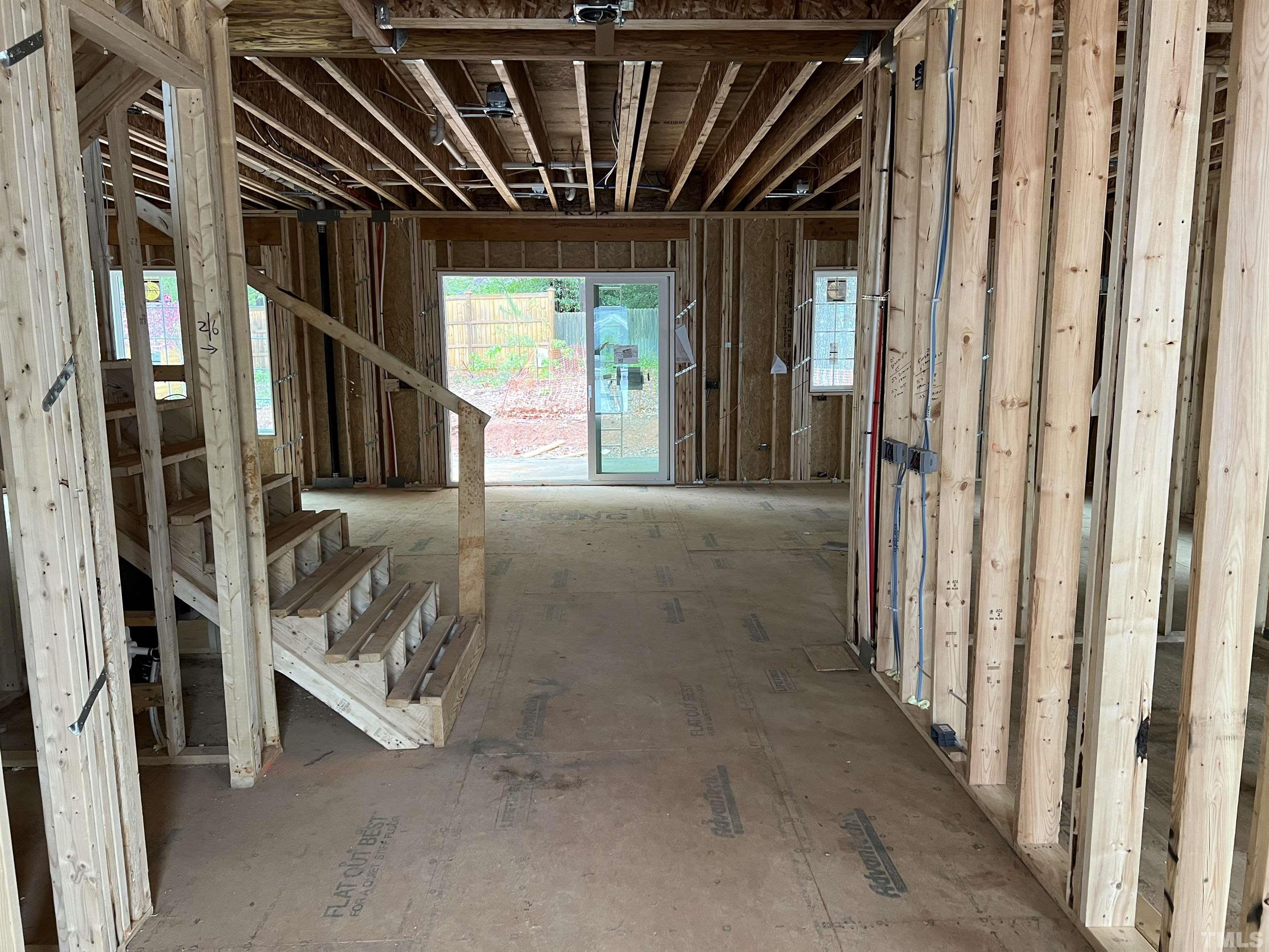 6309 Stephens Ridge Raleigh, NC 27615 - Photo 3 of 14 a view of an entryway with staircase