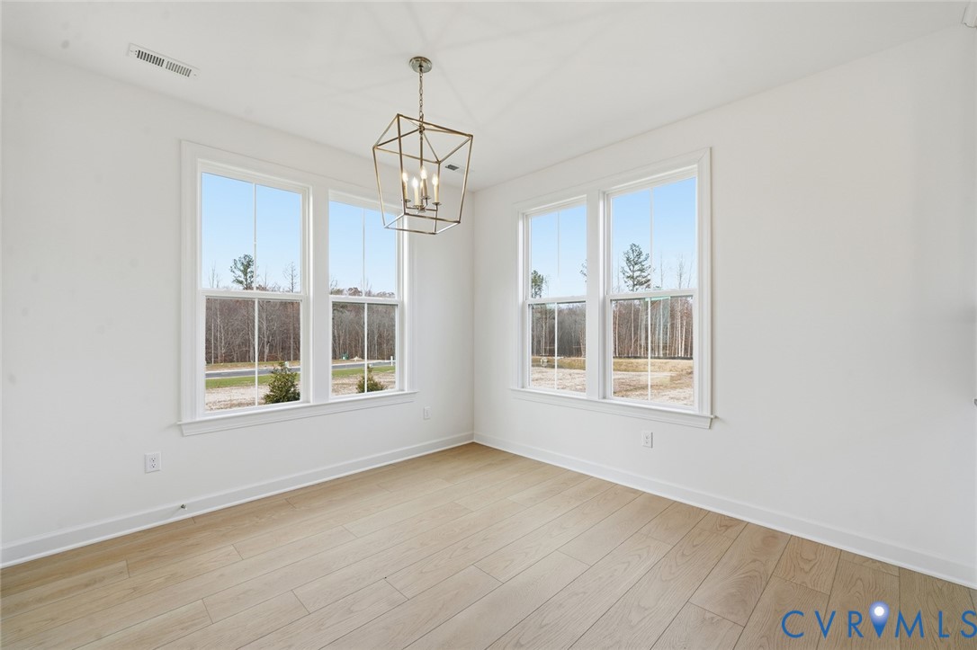 19025 Palisades Ridge Moseley, VA 23120 - Photo 7 of 41 a view of an empty room with a window