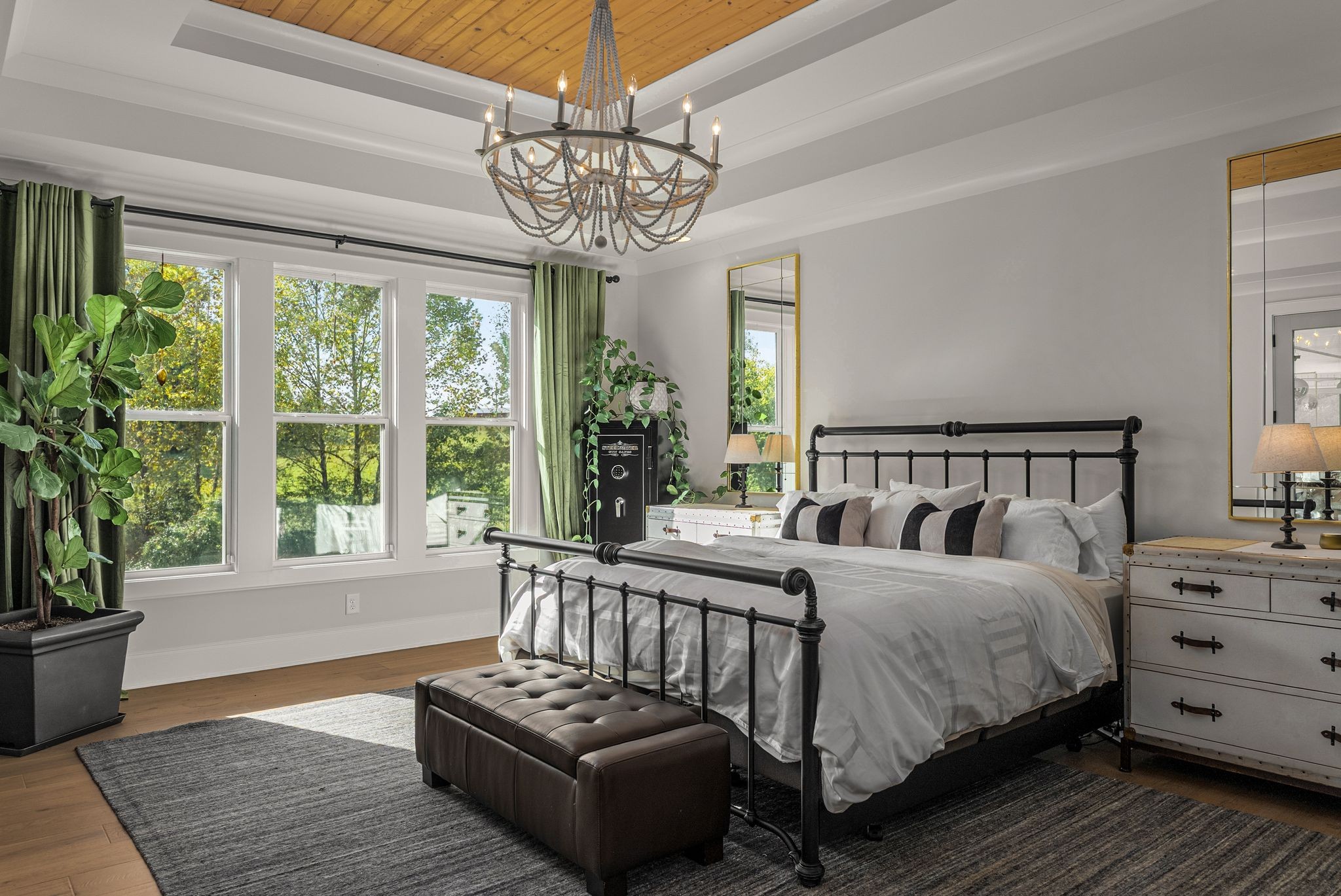 1780 Berea Church Road Lebanon, TN 37087 - Photo 24 of 62 a bedroom with a bed and a chandelier