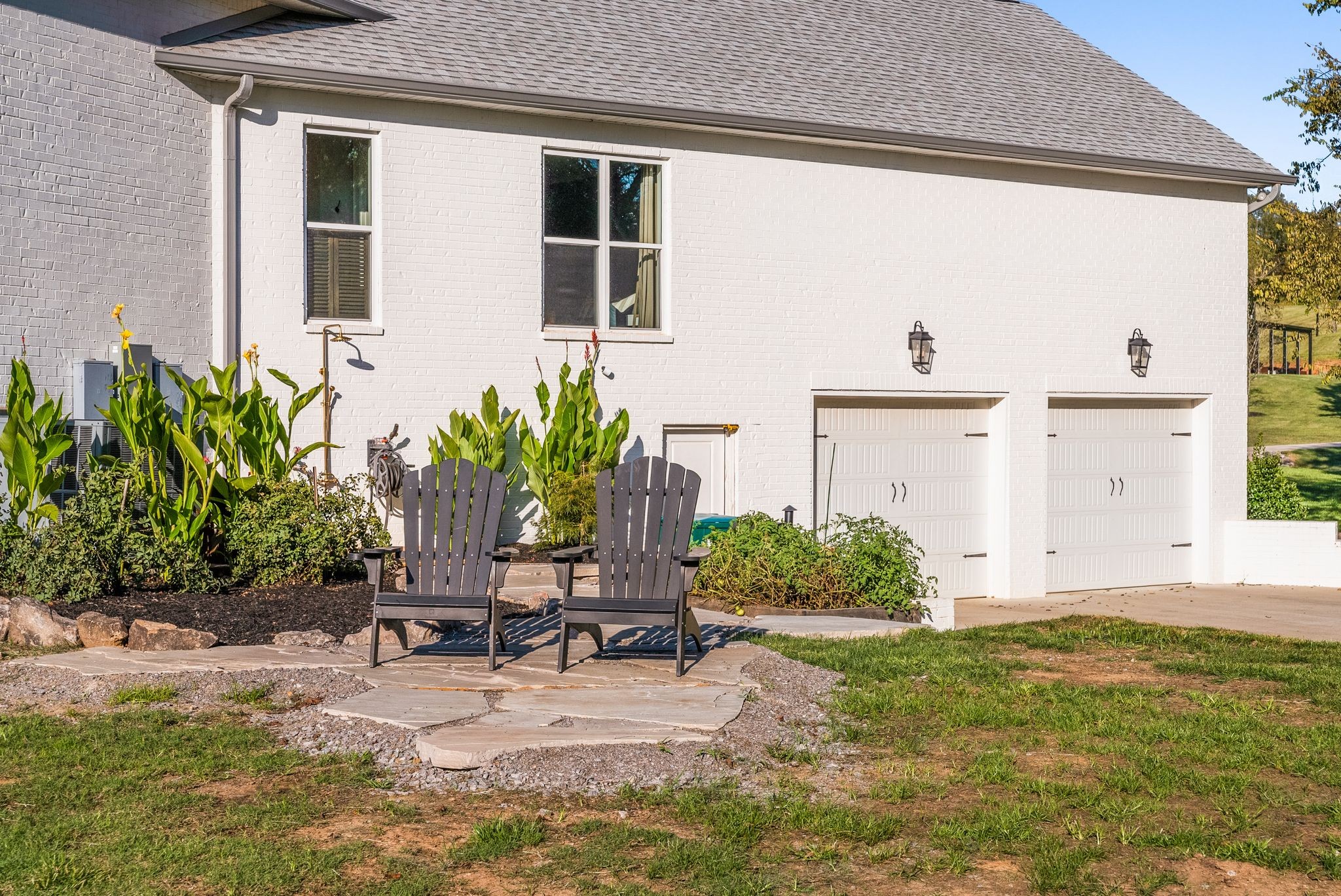 1780 Berea Church Road Lebanon, TN 37087 - Photo 49 of 62 a view of a backyard with chair and potted plants