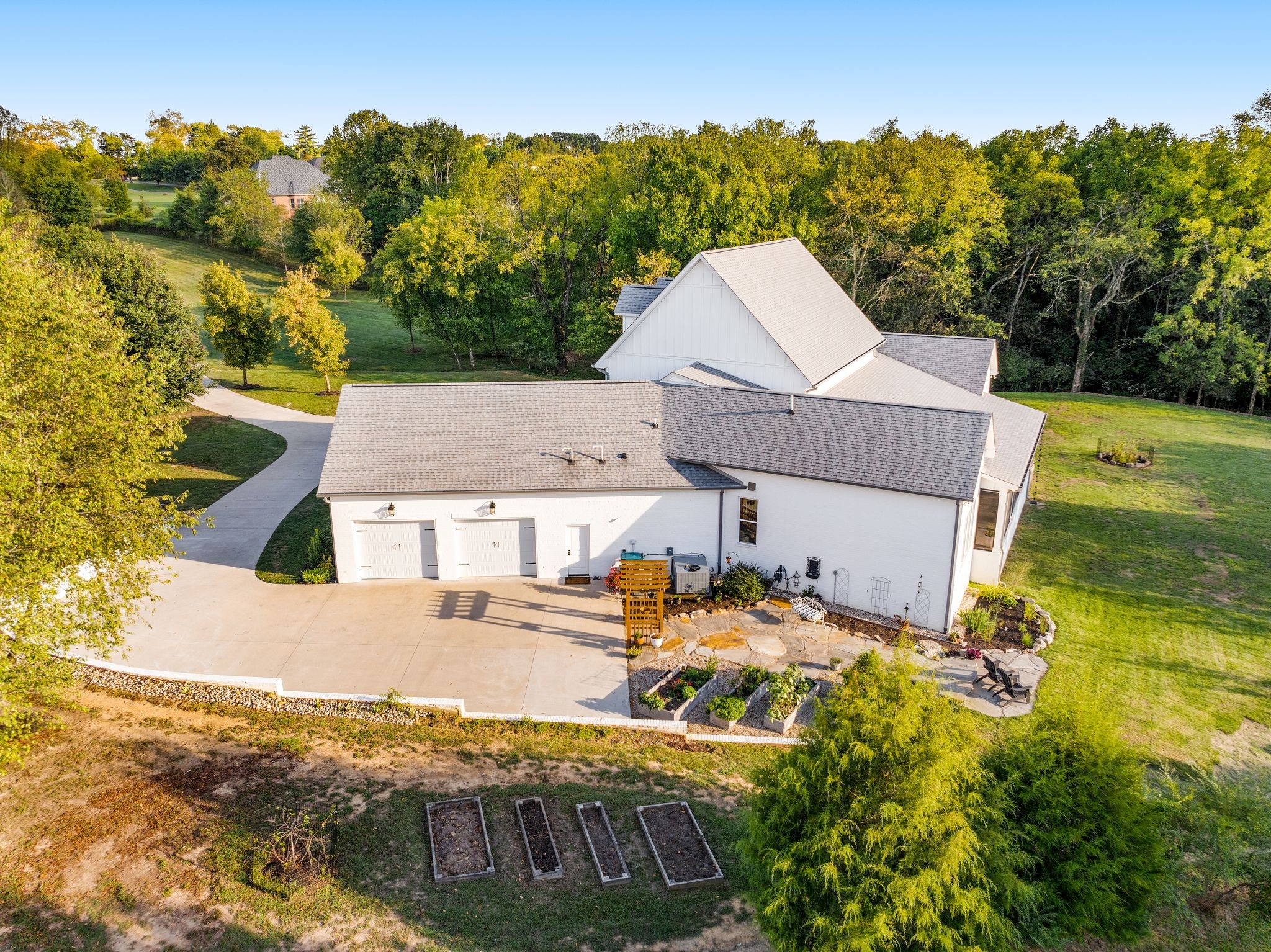 1780 Berea Church Road Lebanon, TN 37087 - Photo 56 of 62 an aerial view of a house with swimming pool and garden