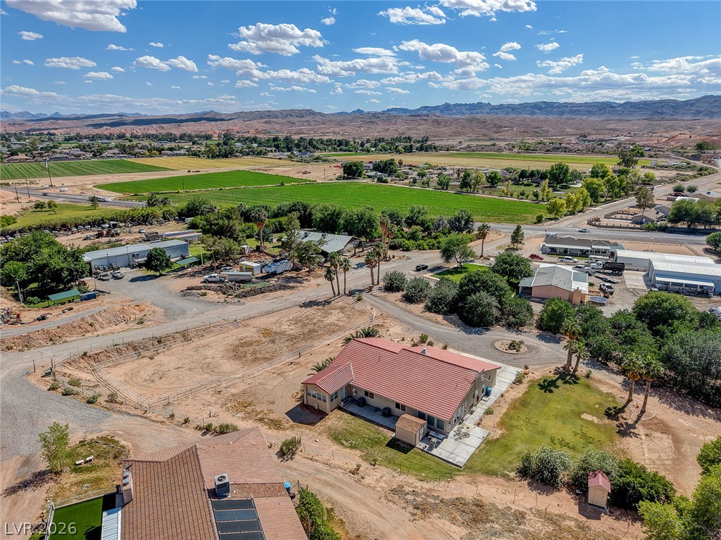 1950 Bowman Road Logandale, NV 89021 - Photo 78 of 81 An aerial perspective reveals a vast rural property featuring a residential building and ample surrounding land.