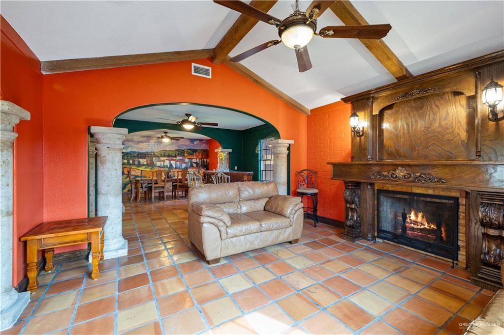 610 North Texas Street Rio Grande City, TX 78582 - Photo 5 of 23 a living room with furniture and a fireplace