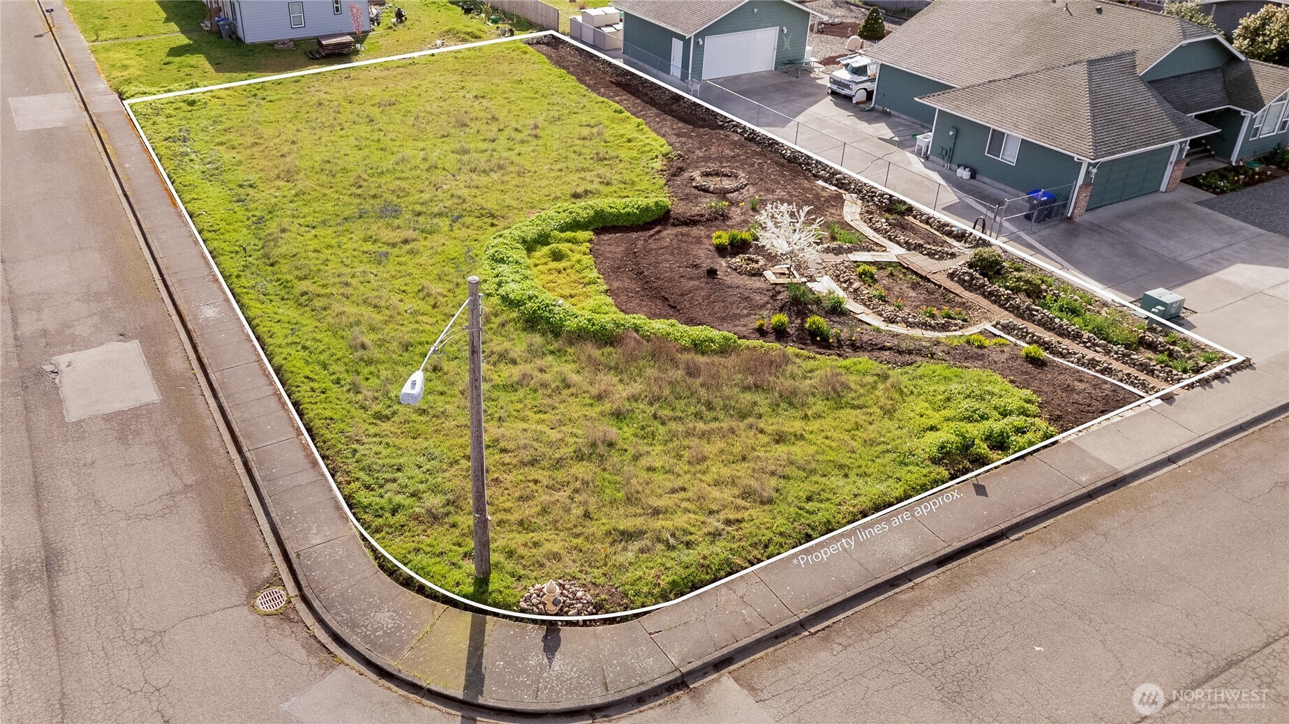 9999 North Honeycomb Circle Sequim, WA 98382 - Photo 4 of 12 a view of a swimming pool with a chairs
