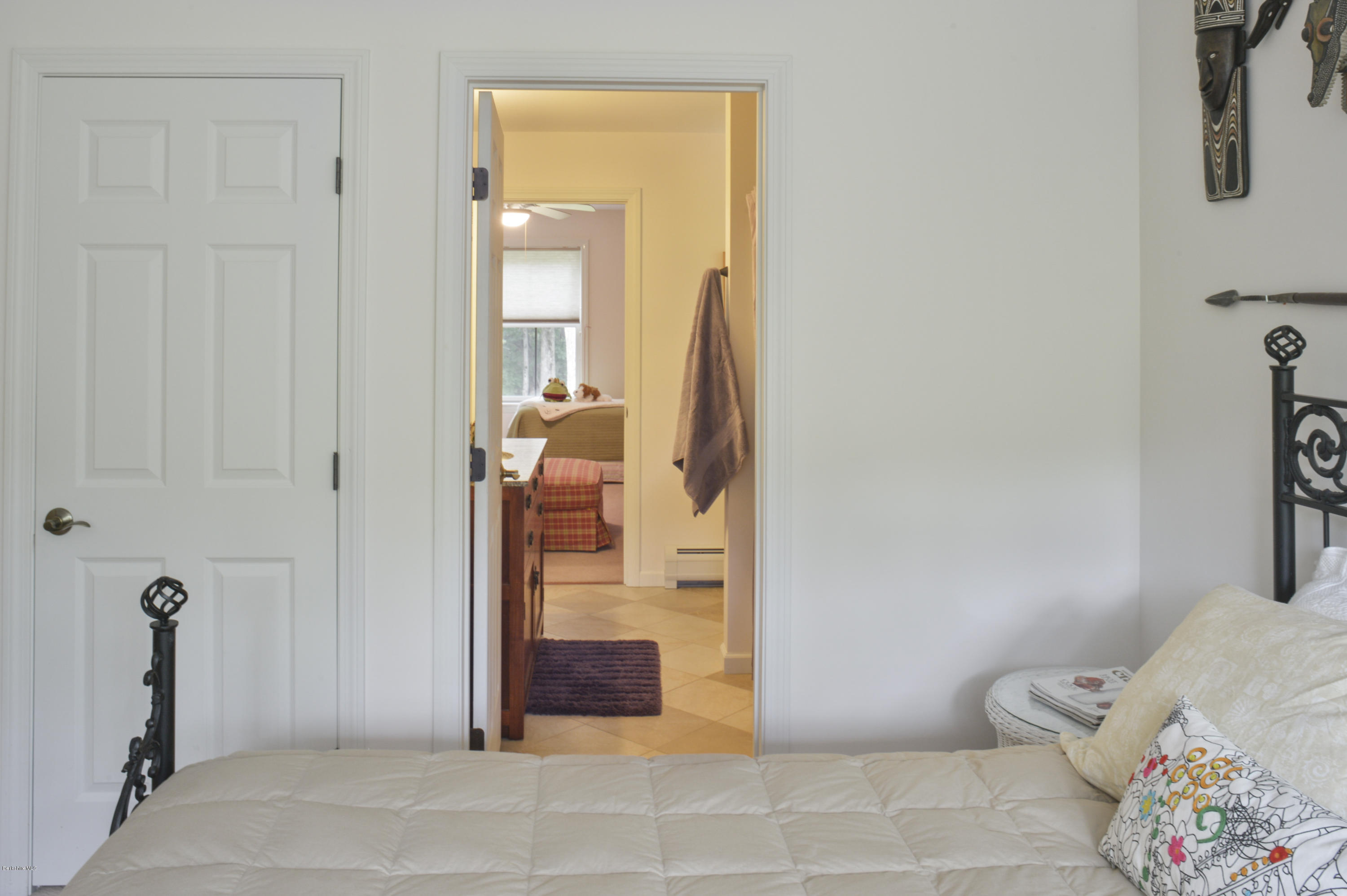 24 Point Road Monterey, MA 01245 - Photo 13 of 17 a bedroom with a bed and a table