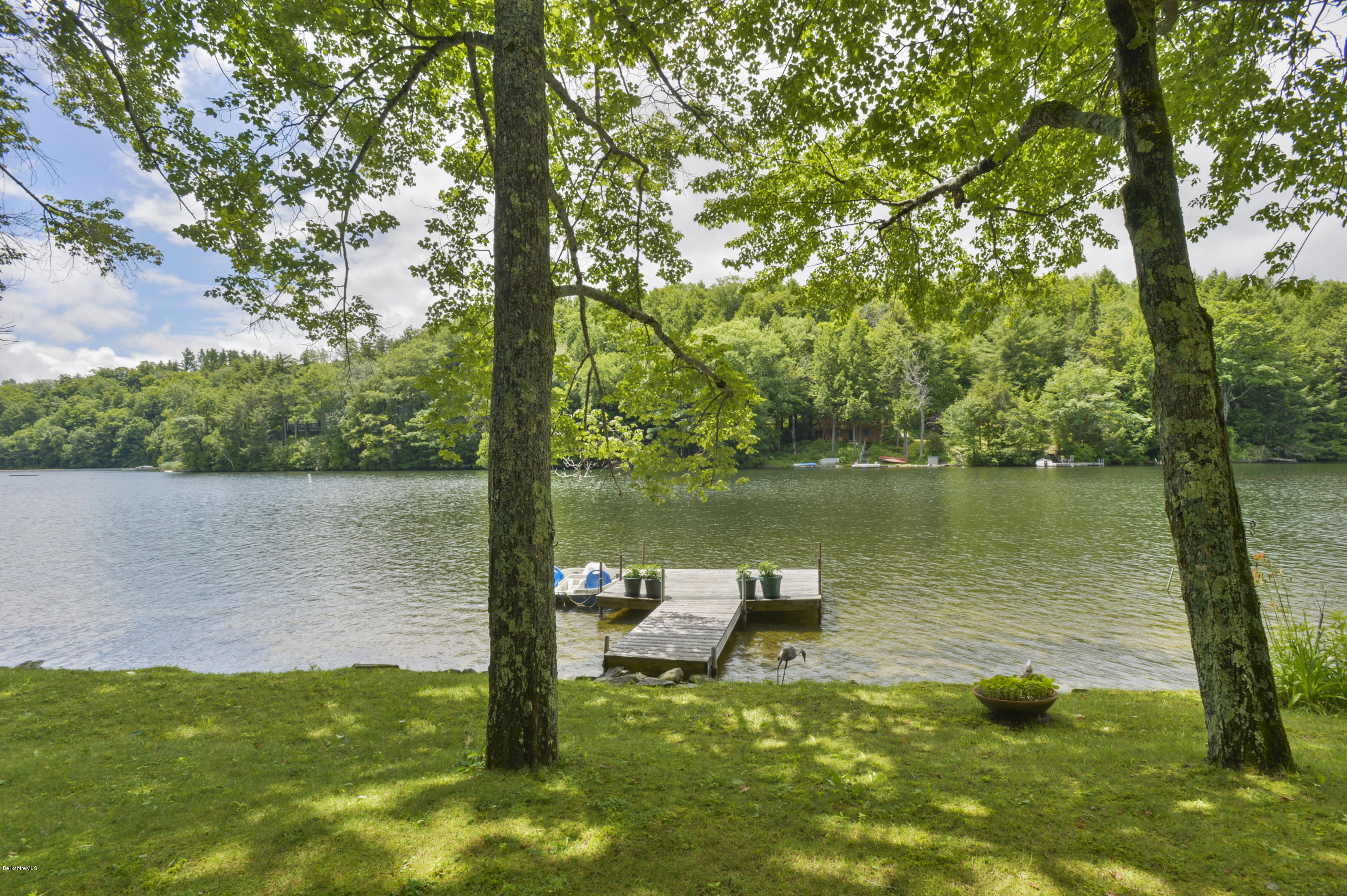 24 Point Road Monterey, MA 01245 - Photo 15 of 17 a view of a lake from a yard