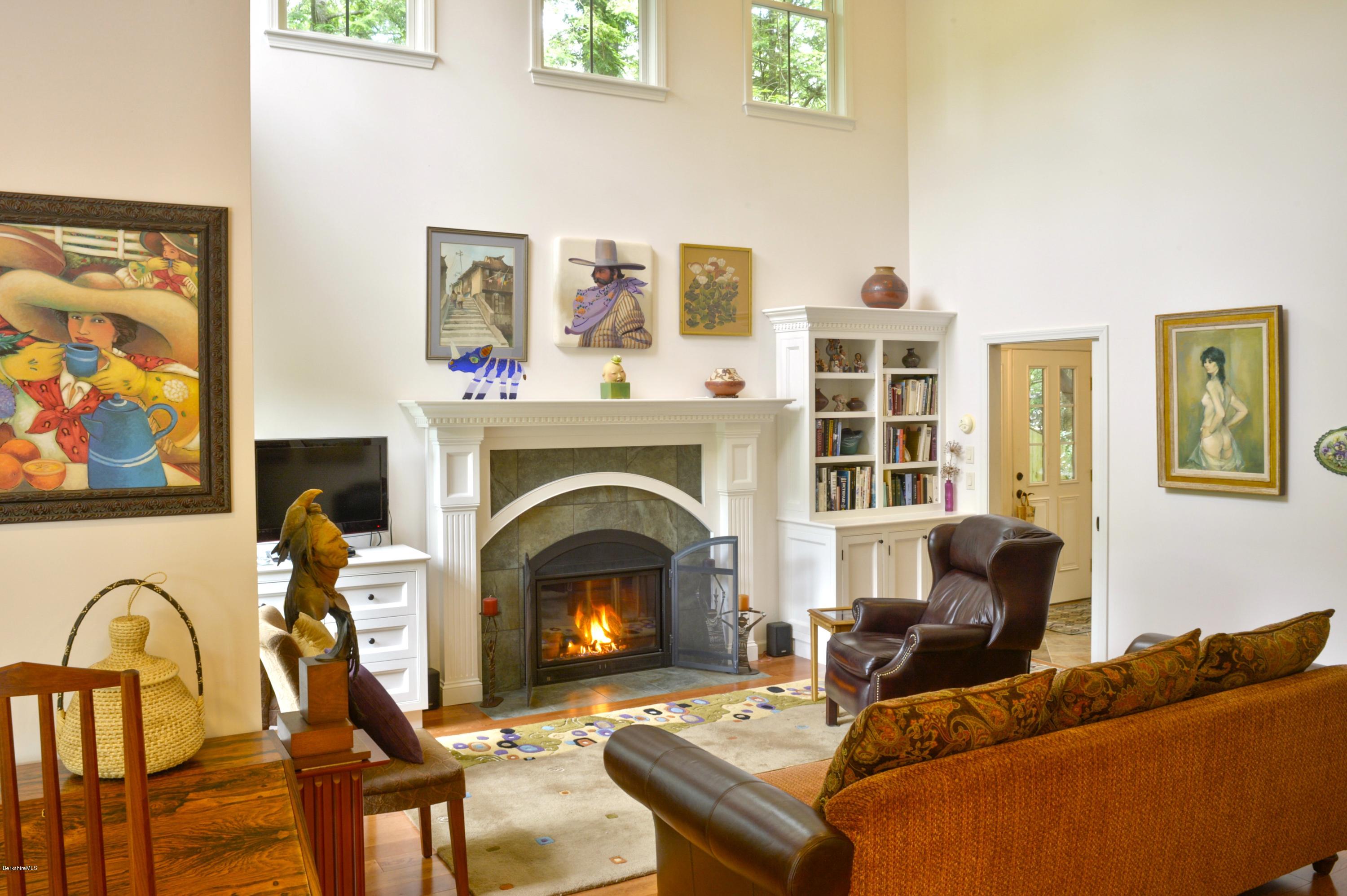 24 Point Road Monterey, MA 01245 - Photo 4 of 17 a living room with furniture and a fireplace