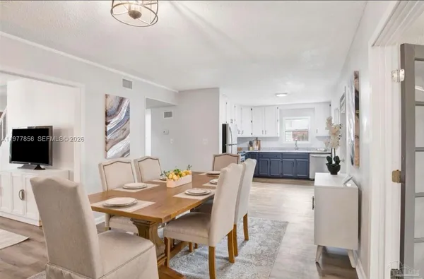 a view of a dining room with furniture