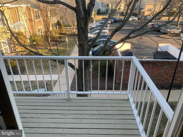 a balcony with a bench
