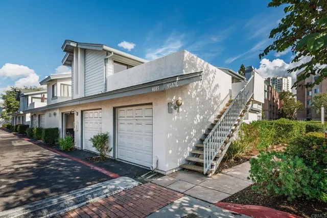 a view of a building with a yard