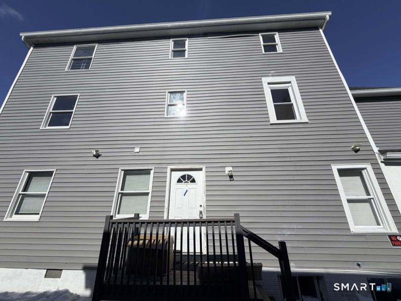 30 Dora Street Stamford, CT 06902 - Photo 1 of 18 a view of a house with a deck