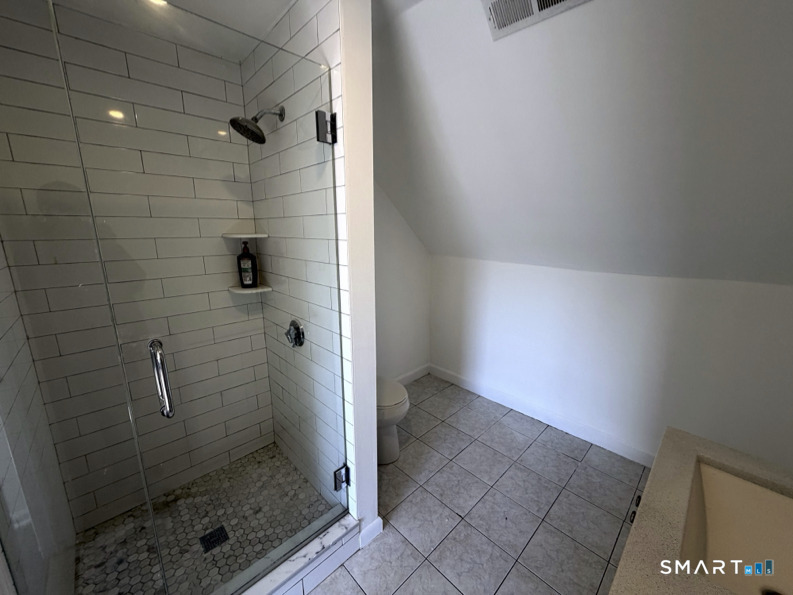 30 Dora Street Stamford, CT 06902 - Photo 16 of 18 a bathroom with a shower