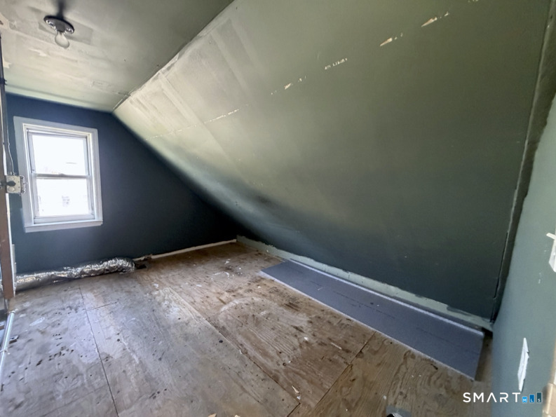 30 Dora Street Stamford, CT 06902 - Photo 17 of 18 an empty room with windows