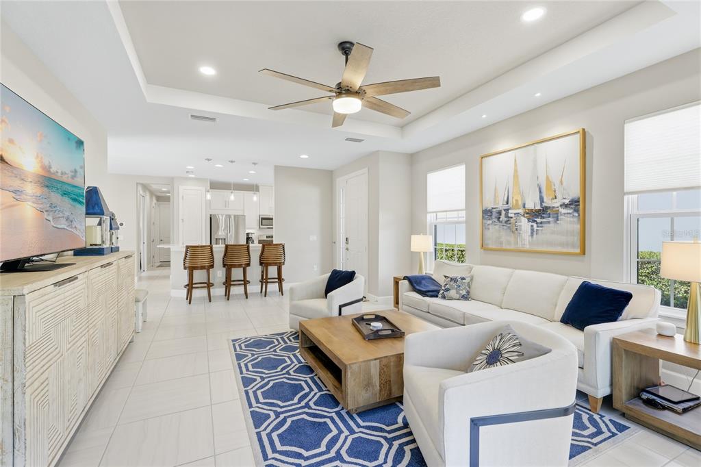 5804 Semolino Street Nokomis, FL 34275 - Photo 11 of 53 a living room with furniture and a large window