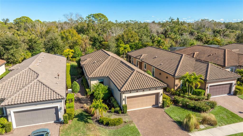 5804 Semolino Street Nokomis, FL 34275 - Photo 30 of 53 a aerial view of a house with a garden