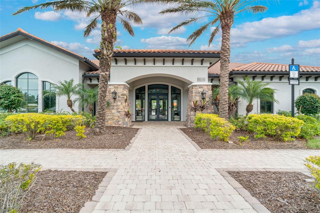 5804 Semolino Street Nokomis, FL 34275 - Photo 37 of 53 a front view of a house with a garden