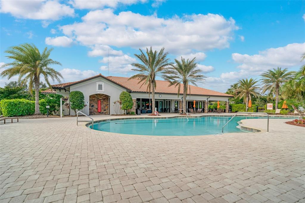 5804 Semolino Street Nokomis, FL 34275 - Photo 46 of 53 a view of house with swimming pool and green space