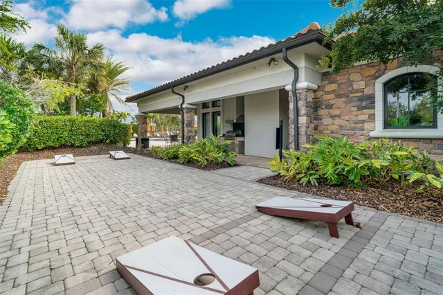 a view of outdoor space with playground and green space